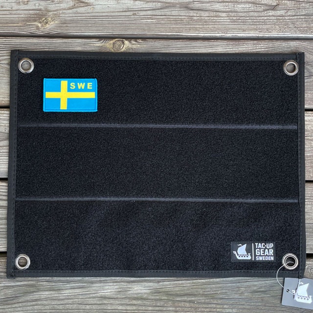 A Kardborre Wall Mat Display Black Small with a patch on it