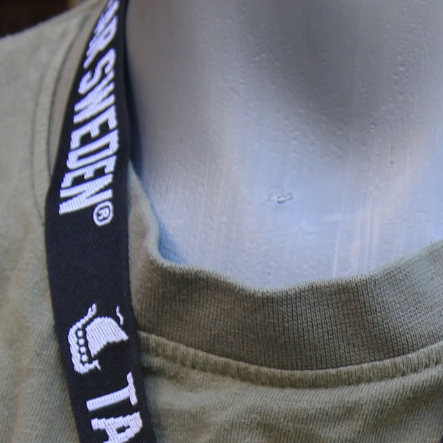 Text and logo on a Lanyard Black/White.