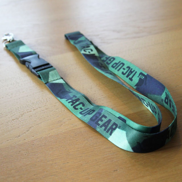 Our popular M90 Neck Lanyard during product photoshoot laying on the floor.