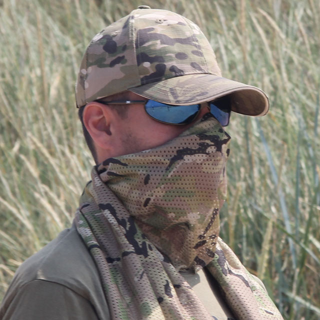 A Mesh Scarf Multicam used as face veil