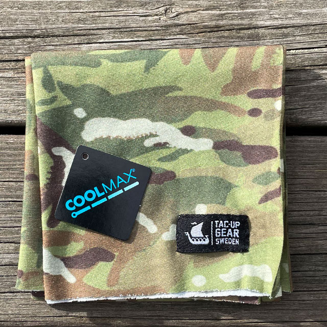 A folded The Multiwrap Coolmax Camo from TAC-UP GEAR