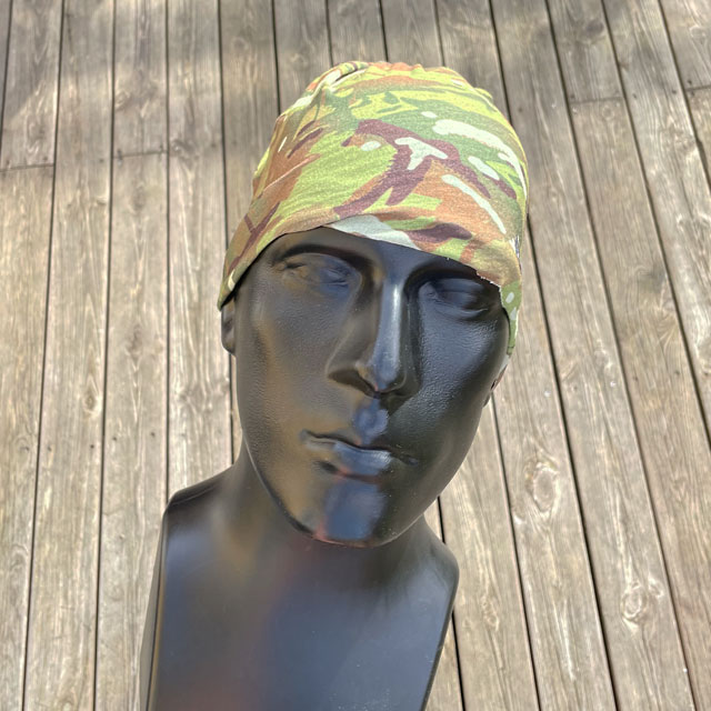 The Multiwrap Coolmax Camo from TAC-UP GEAR used as a beanie seen from the front