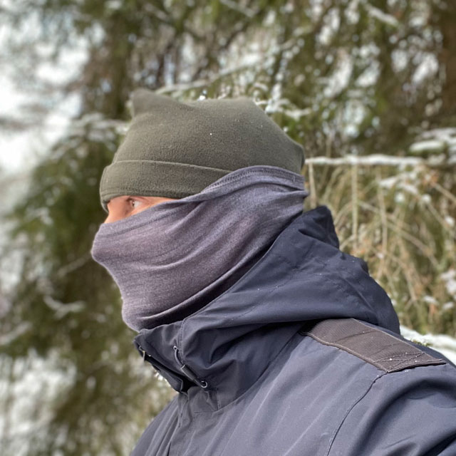 Neck Tube Merino Wool Grey from TAC-UP GEAR seen worn in Swedish winter forest on man from the side