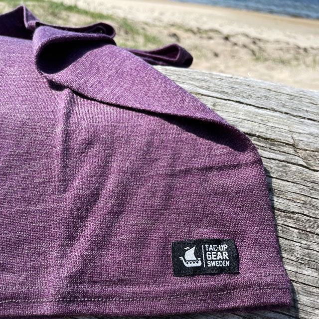 Neck Tube Merino Wool Purple from TAC-UP GEAR on a log