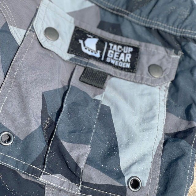 NEPTUNE Shorts M90 Grey closeup on back pocket with Tac-Up Gear logo on lid