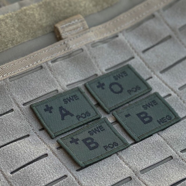 Blood Type Hook Patches Dark Green from TAC-UP GEAR seen from an angle mounted on a 5.11 plate carrier