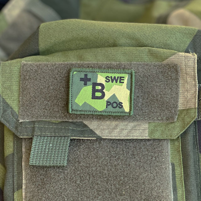 B-POS Blood Type Hook Patch M90 patch from TAC-UP GEAR on a NCWR Jacket M90 sleevepocket