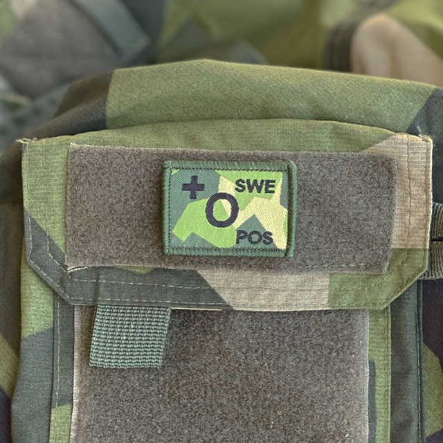 O-POS Blood Type Hook Patch M90 patch from TAC-UP GEAR on a NCWR Jacket M90 sleevepocket
