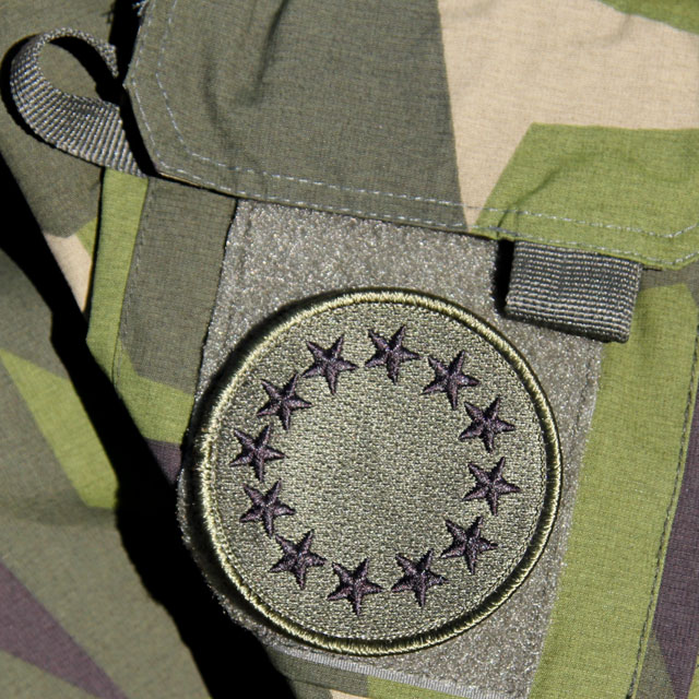 A EU Green Embroidered Patch mounted on a NCWR M90 Jacket.