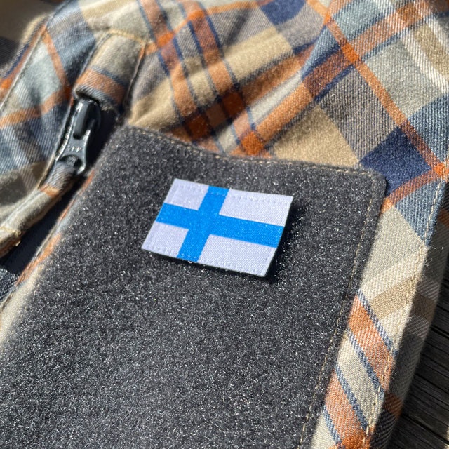 Finland Flag Hook Patch Small from TAC-UP GEAR mounted on a velcro arm