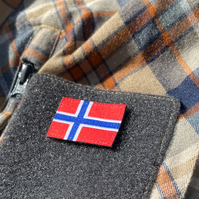 A Norway Flag Hook Patch Small from TAC-UP GEAR seen from an angle