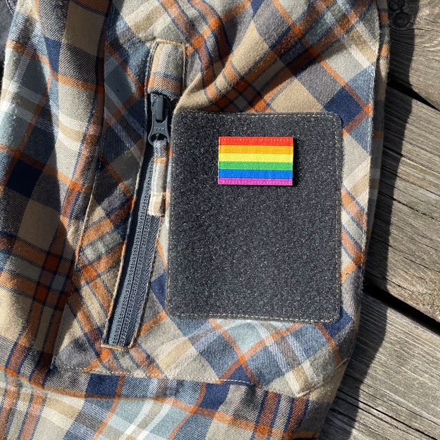 A Rainbow Flag Hook Patch Small mounted on velcro sleeve