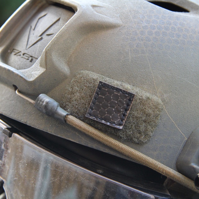 A IR Tactical Glint Square - 2 cm mounted on an Ops Core Helmet for IR recognition.