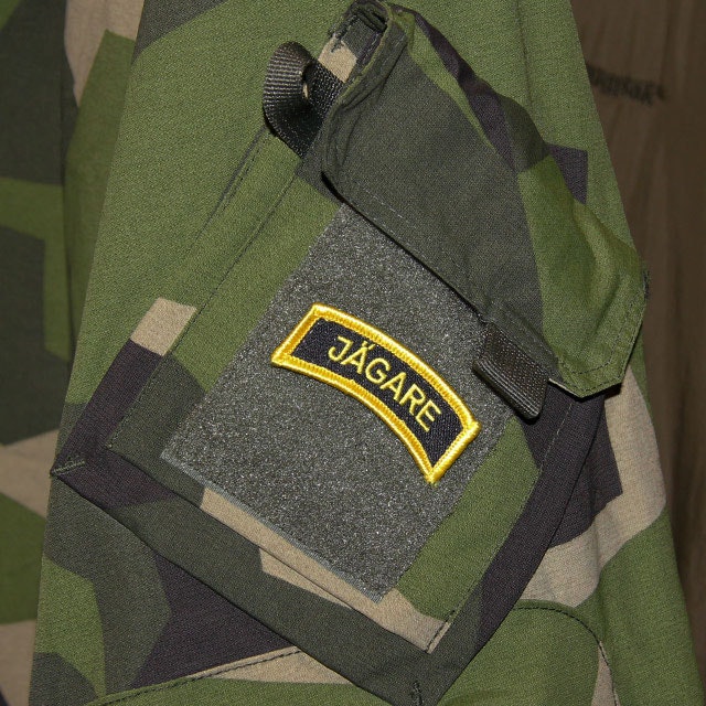 A Mounted JÄGARE Hook Patch Yellow/Black/Yellow on a M90 NCWR Jacket arm.