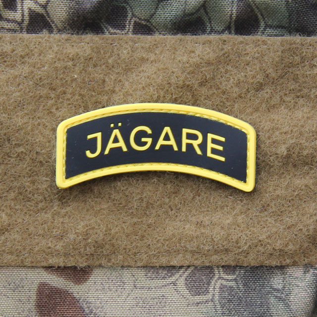 A mounted JÄGARE Yellow/Black/Yellow PVC Patch.