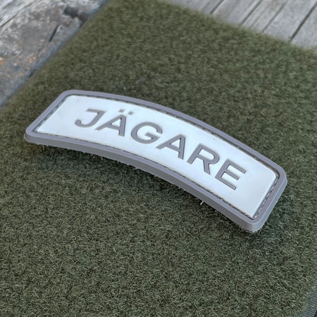 JÄGARE Hook PVC Patch Grey/White seen from an angle