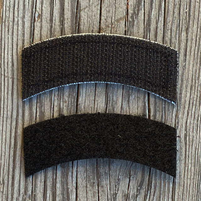 A JÄGARE K3 Type Hook Patch Black/Green seen from the back with its loose black loop piece