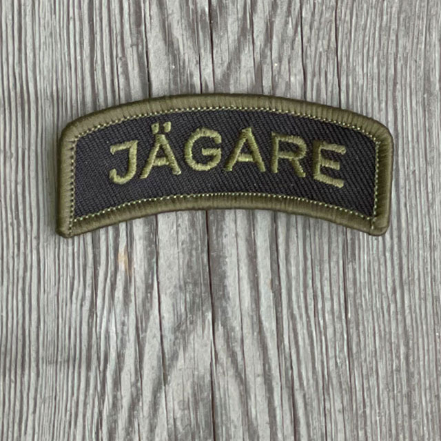 JÄGARE Sew On Patch Green/Black from TAC-UP GEAR seen from the front