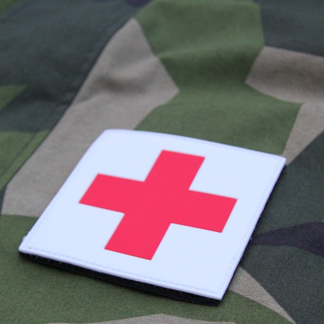 M90 camouflage background and a Medic Cross PVC Hook Patch.