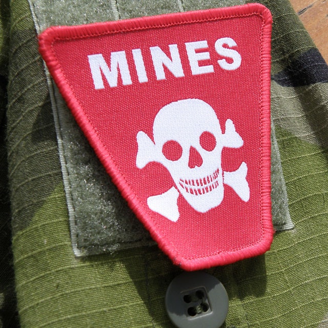 M90 background and a Mines Hook Morale Patch.