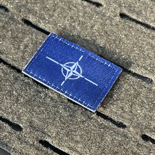 NATO Flag Hook Patch Small from TAC-UP GEAR seen from an angle