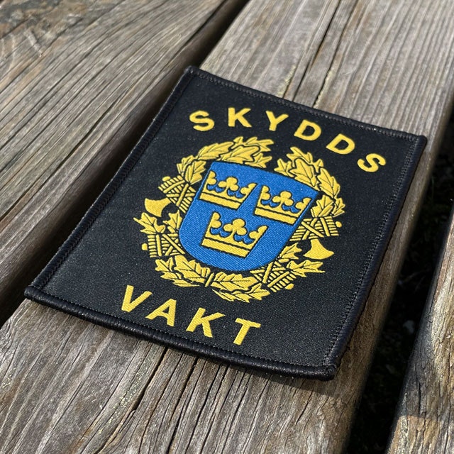 Skyddsvakt tygmärke kardborre från TAC-UP GEAR sedd från en vinkel