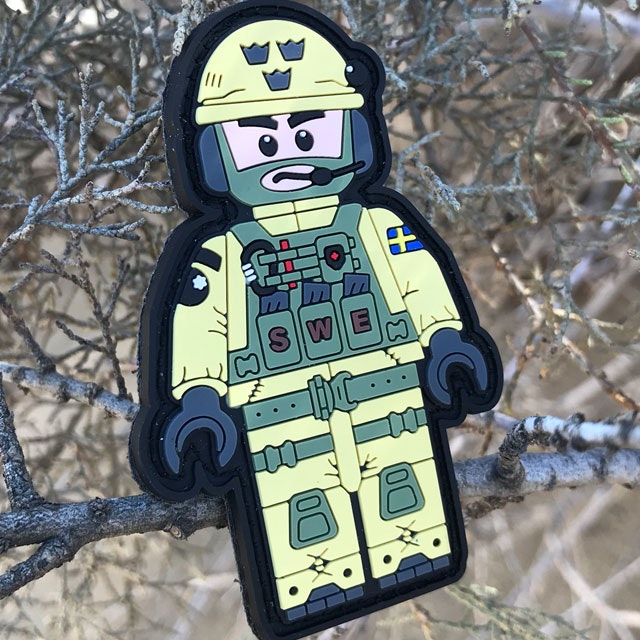 Outdoors photo of a SWE SOG PVC Figur Patch.