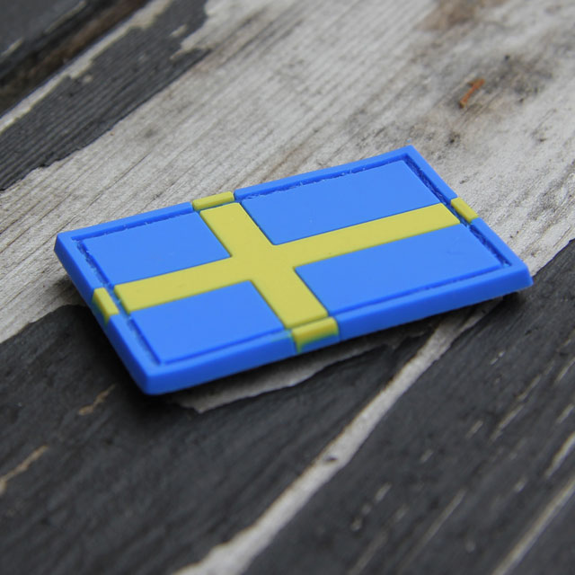 Woody background and a Sweden Flag PVC Arm Patch.