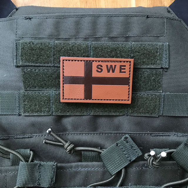 The Sweden Flag Leather Patch accentuating the ranger green plate carrier.
