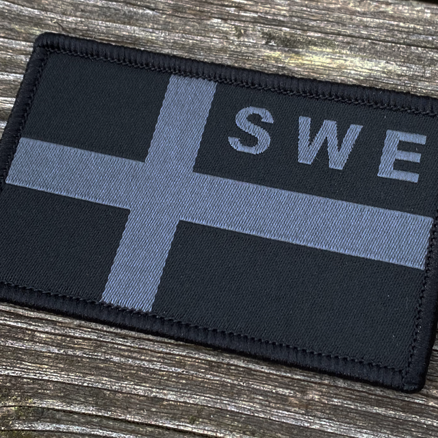 A close up on a Sweden Flag OPS Nylon Black/Grey Patch