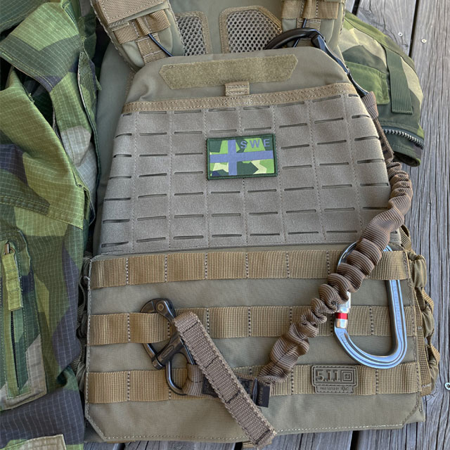 A Sweden Flag OPS M90 Patch from TAC-UP GEAR on a 5.11 plate carrier