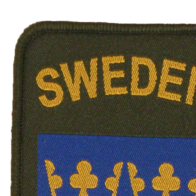 Close up of a Sweden Sew-On Patch Green.