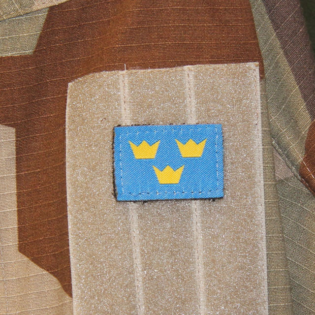 Three Crowns Morale Patch with M90K Desert background.