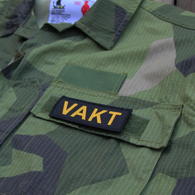 VAKT Kardborremärke.