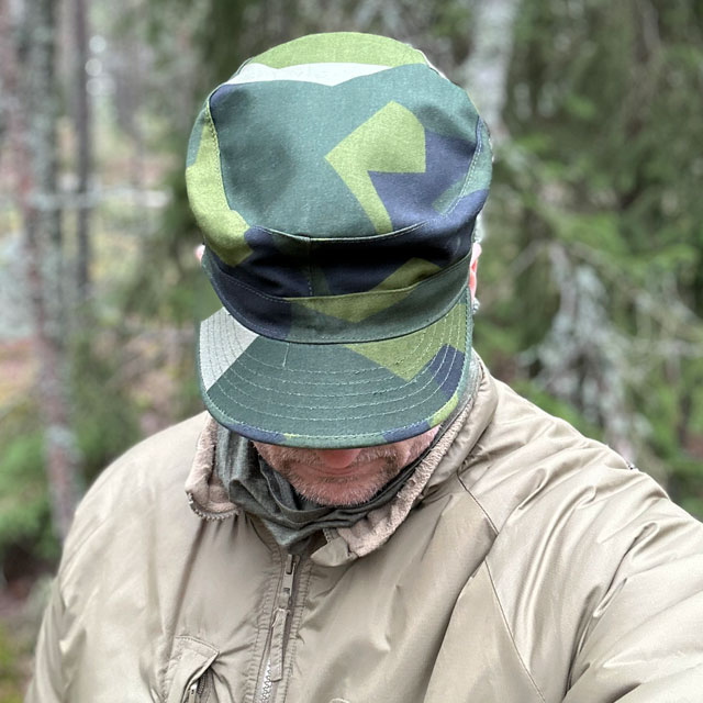 A Patrol Cap M90 from TAC-UP GEAR on a model in the Swedish forest showing the top