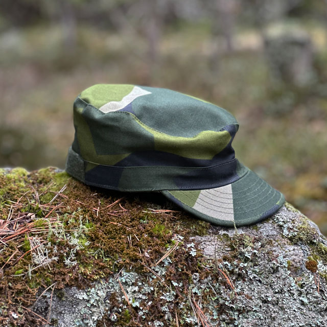 The Patrol Cap M90 from TAC-UP GEAR on a rock