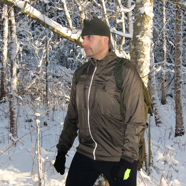 Winter in Sweden and training is on wearing a Running Jacket Green.