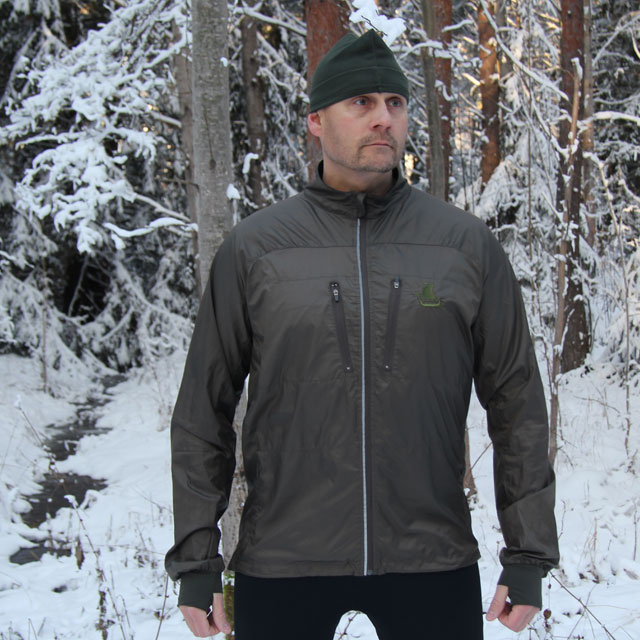 Swedish winter photoshoot of a Running Jacket Green.