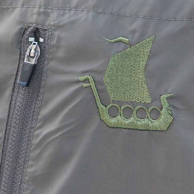 Longboat logo embroidered on a Running Jacket Green.