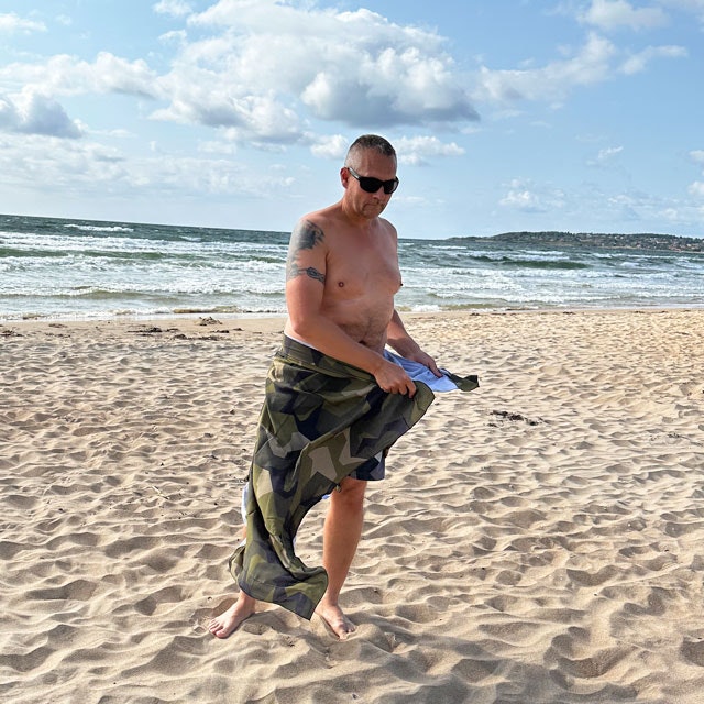 Sarong M90 Camouflage from TAC-UP GEAR is being wrapped around the body