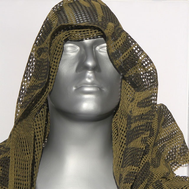 Showing how a Scrim Scarf Black/OD Camo could be draped around the head for concealement.