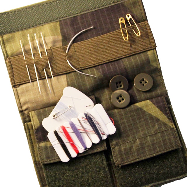 Sewing Case M90 opened and with accessories like needles, buttons and thread in place