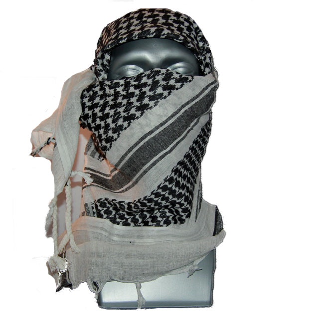 A Shemagh Black/White is draped around the face and head of a mannequin.