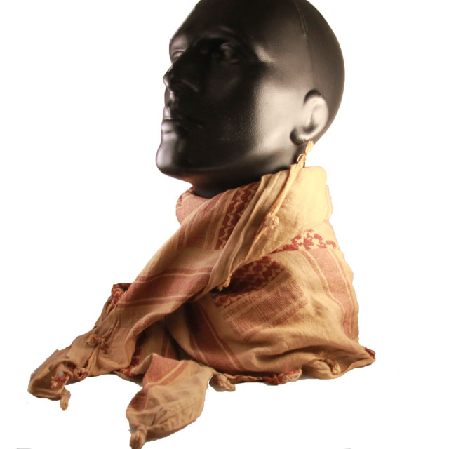 A mannequin is wearing a Shemagh Khaki/Brown draped around its neck.