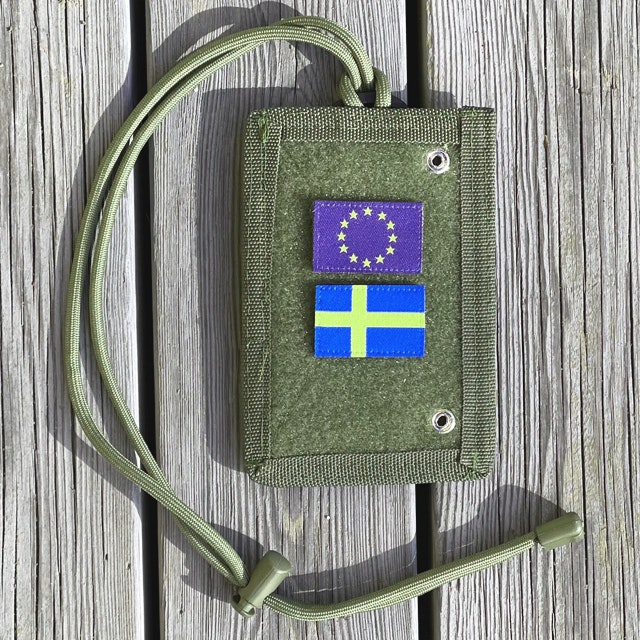 Mounted EU and Swedish flag patches on a Tactical Neck ID Card Holder Green from TAC-UP GEAR