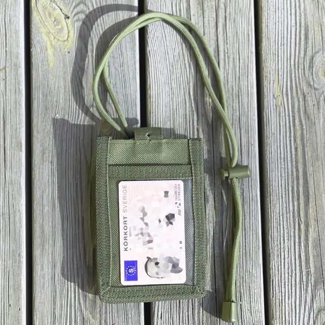 A driver licence in a Tactical Neck ID Card Holder Green from TAC-UP GEAR