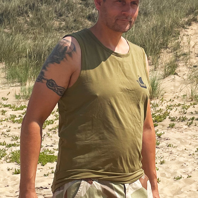 Tank Top Khaki Green from TAC-UP GEAR on model at the ocean seen from side front