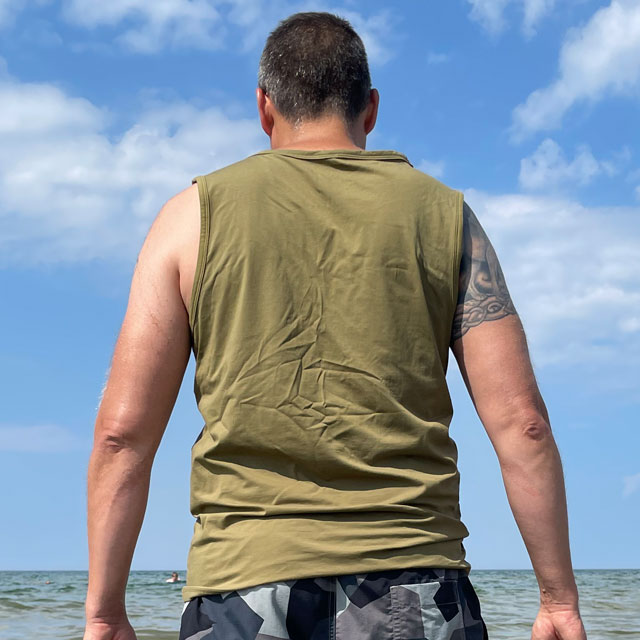 Tank Top Khaki Green from TAC-UP GEAR on model at the ocean seen from the back