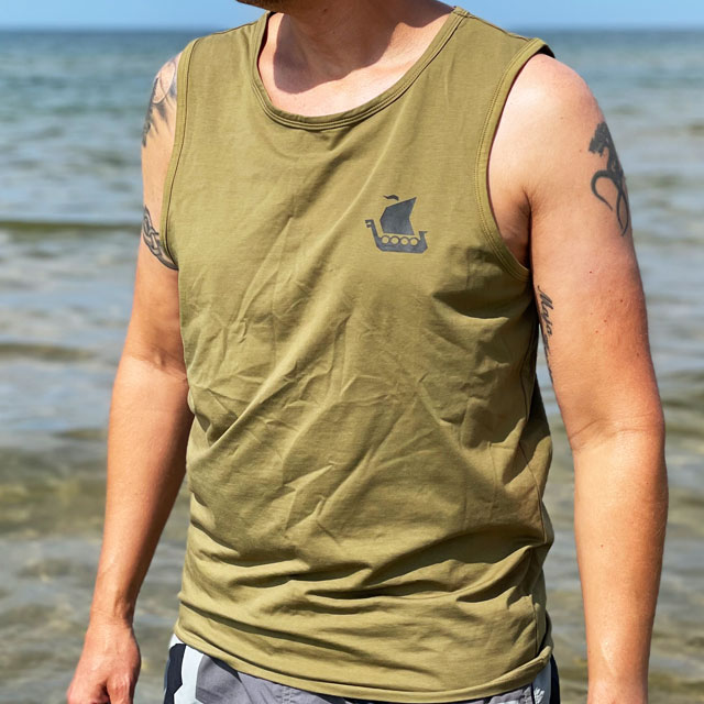 Tank Top Khaki Green from TAC-UP GEAR on model at the ocean seen from an angle of the front