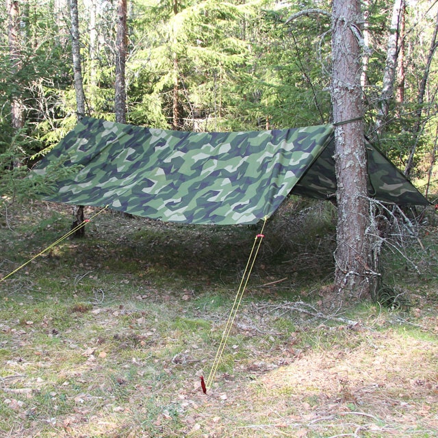 A Tarp M90 Light strung up in the Swedish forest